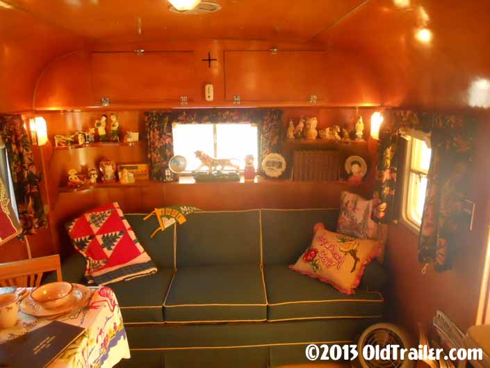 This 1951 Vagabond trailer has a cozy sofa in the living room area