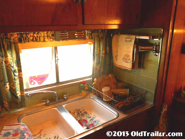 Restored 1951 Vagabond vintage trailer with a side galley area