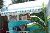 1955 Aljoa trailer with great beach-vide turquoise and white stripped side and front canvas awnings