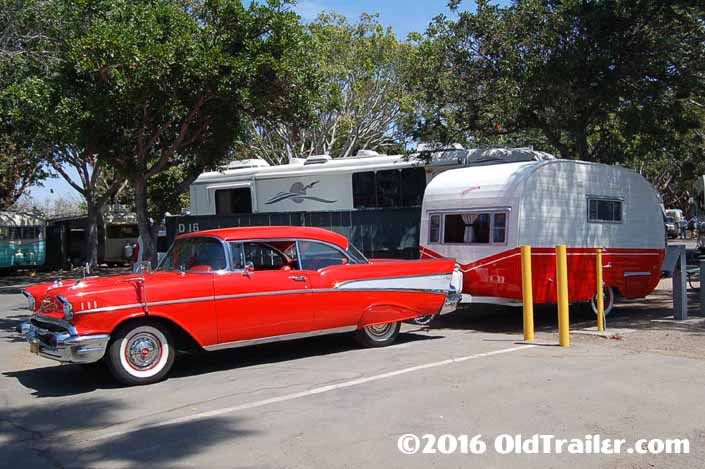 This vintage towing rig is a 1957 chevy bel air 2 door hard top pulling a vintage starfire trailer