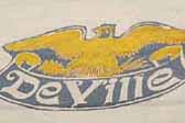Deville logo graphics on the front of a vintage 1960 Deville travel trailer