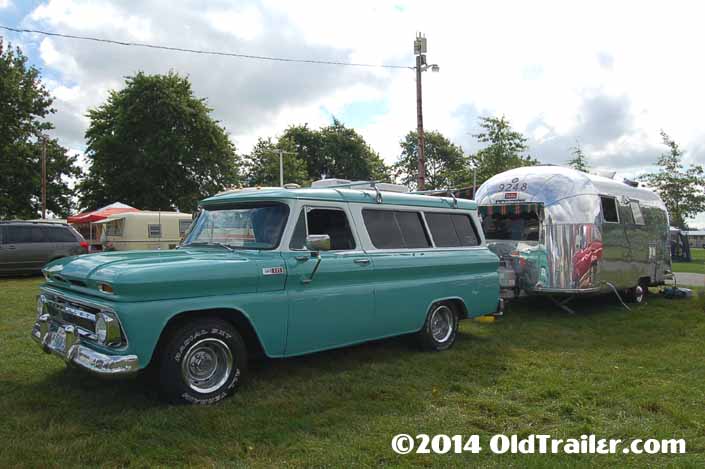 This vintage towing rig is a 1965 chevy suburban pulling a 1963 airstream travel trailer