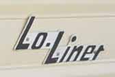Vintage Lo-Liner travel trailer with original Lo-Liner logo script emblem.