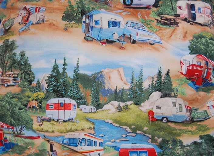 This photo shows a swatch of retro fabric with vintage trailers, station wagons and pickup trucks, for your vintage trailer