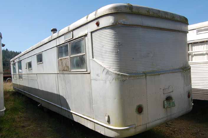 Vintage trailer junk yard has a Spartan Manor trailer with the classic Spartan Manor rear aluminum design
