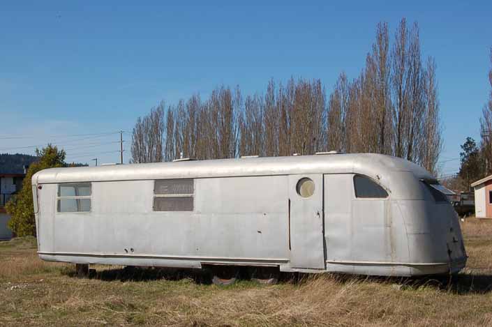 Original Spartan Manor trailer stored in a vintage trailer junkyard is a good candidate for restoration
