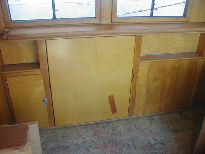 Vintage trailer salvage yard has a 1948 Westcraft Westwood trailer with wood work and flooring in good condition