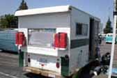 Awesome custom truck based trailer camper combined with a classic VW bus, kept the original vw bus engine access door