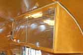 Beautiful ceiling cabinets with custom metal door panels in 1936 Airstream Clipper 