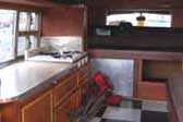 1947 Dodge Fishing Car camper has very efficient yet cozy interior cabinets and furnishings