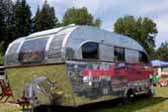 Front view of a nicely restored 1948 Aero Flite travel trailer