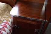 Perfectly designed bedroom nightstand cabinet in a 1948 Aero Flite vintage trailer
