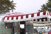 Picture of red and white striped awning on a 1948 Boles Aero vintage trailer