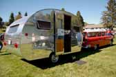 A vintage 1948 boles aero trailer with a 1955 chevy station wagon tow vehicle