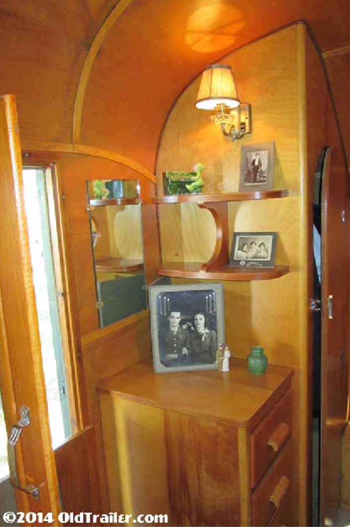 This 1948 vagabond trailer still has the original corner closet cabinet in the rear bedroom