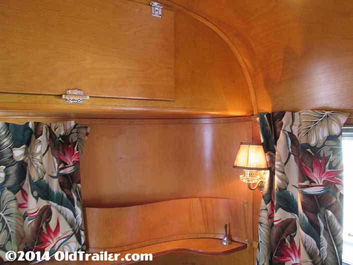 Front ceiling cabinets in a vintage 1948 Vagabond trailer living room