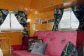 Photo shows the front ceiling cabinets in a vintage 1949 Vagabond trailer