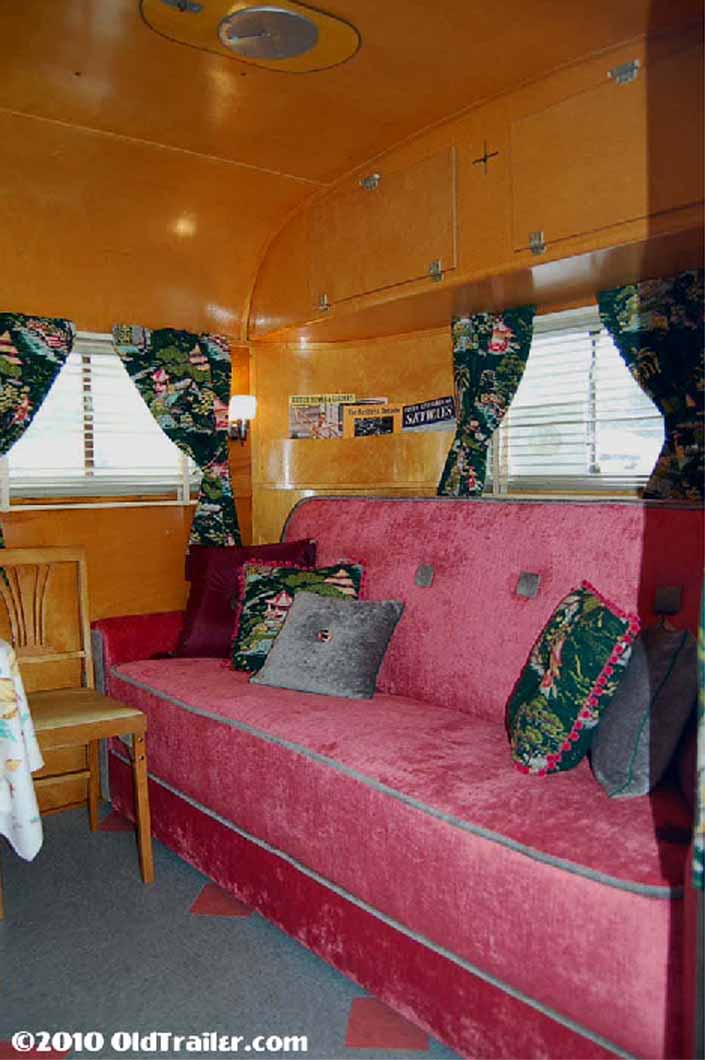 Living room ceiling cabinets in a vintage 1949 vagabond trailer