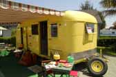 Restored 1950 Vagabond model 19 trailer camping at Pismo Vintage Trailer Rally