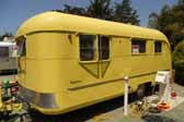 Picture of a 1950 Vagabond model-19 trailer painted lemon yellow