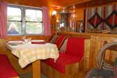 Great dining area on the street-side of a vintage 1950 Vagabond trailer
