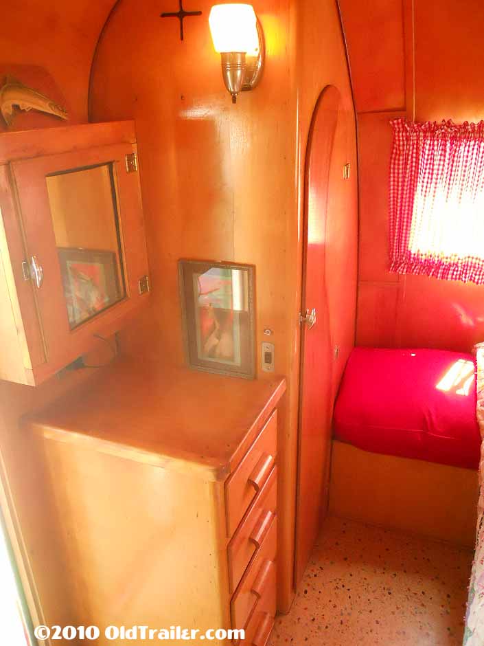 Original bedroom closet cabinet in a 1950 Vagabond travel trailer