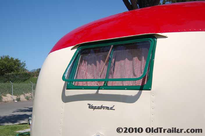 This vintage 1950 Vagabond vintage trailer has a beautifully restored rear window unit