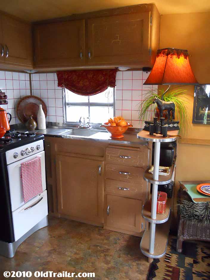 This vintage 1950 vagabond trailer has a beautifully restored kitchen