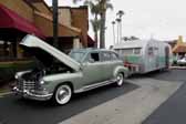 Picture of a 1941 cadillac limo towing a 1951 spartanette tandem trailer