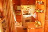 Picture of the gorgeous interior cabinetry in a restored 1951 Vagabond trailer