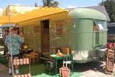 Picture of a 1951 Vagabond trailer setup for camping at the Pismo Vintage Trailer Rally