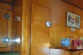 Photo of the restored interior cabinets in a 1951 Vagabond travel trailer
