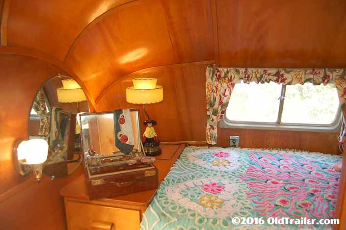 1951 Vagabond travel trailer with a nightstand cabinet in the bedroom