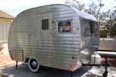 Photo of a classic 1953 Sportcraft by Aljoa canned ham trailer