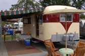 Vintage 1953 Vagabond trailer setup for camping at the Pismo Vintage Trailer Tally
