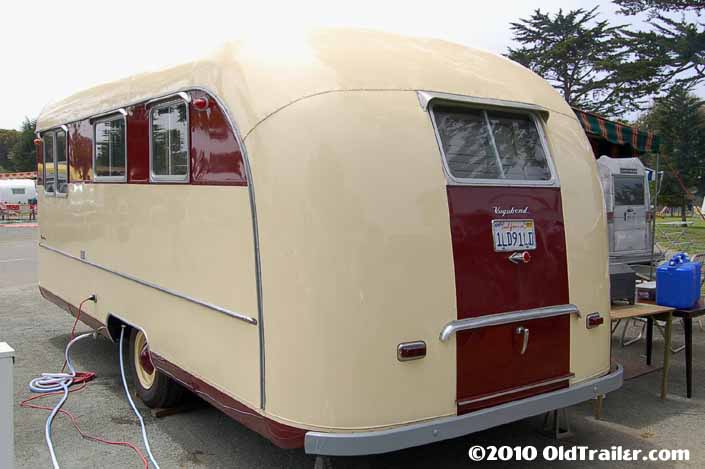 This 1953 Vagabond travel trailer has a storage compartment door in the rear end