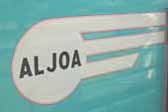 Vintage 1955 Aljoa canned-ham trailer with new Aljoa logo graphics panel on the side