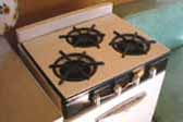 Cool black and white porcelain finish on 1955 Shasta Trailer gas stove