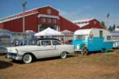 Picture of a 1956 chevy 150 two door sedan towing a 1956 shasta trailer