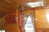Perfect varnish job shows amazing wood grain on cabinets in 1956 Shasta Trailer