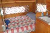 Retro patchwork quilt bedspread in 1956 Shasta Trailer