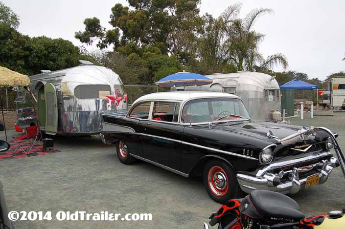This vintage towing rig is a 1957 chevy bel air 2 door sedan pulling a vintage clipper trailer