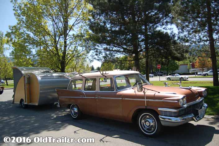 This vintage towing rig is a 1958 Studebaker Provincal Wagon pulling a vintage tear drop trailer
