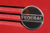 Classic Federal logo badge on the hood of a 1959 Federal Truck-based camper