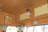 Re-finished ash cabinets and paneling in 1959 Shasta Airflyte Trailer
