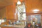 Very nicely restored cabinets and paneling in 1959 Shasta Airflyte Trailer