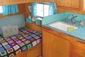 Classic Granny Afghan crocheted squares bedspread in 1959 Shasta Airflyte Trailer