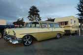 Photo shows a vintage 1959 winnebago trailer and matching 1956 chevy 210 wagon tow vehicle