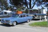 Vintage 1960 Holiday House trailer and vintage 1959 Pontiac Bonneville Safari station wagon tow vehicle