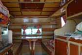 Spectacular nautical inspired interior woodwork on a unique camper on th ebaqck of a 1960 International Pickup Truck